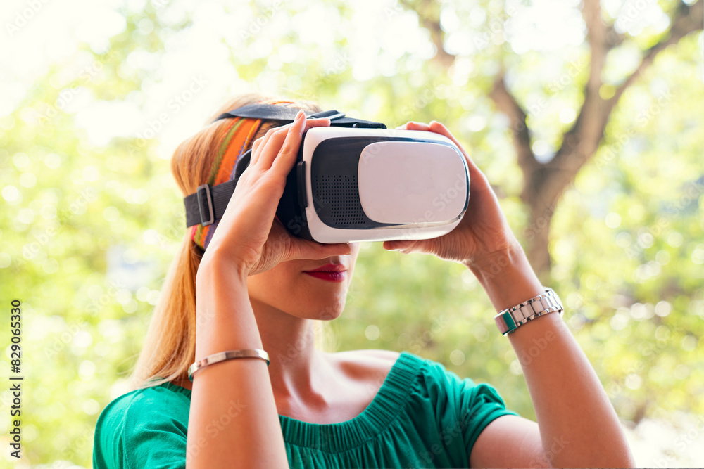 woman wearing vr glasses outside woman wearing vr glasses outside
