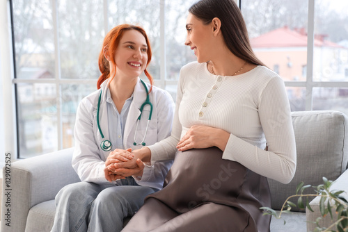 Young pregnant woman with d...