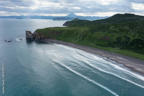 Khalaktyrsky beach with black sand on Kamchatka peninsula, Russia, Pacific ocean photo