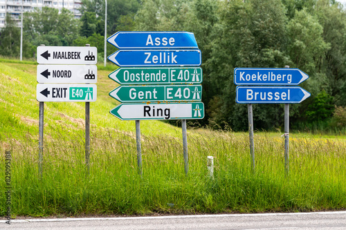 Groot-Bijgaarden, Flemish Brabant, Belgium - Highway exit signs and directions to major cities photo