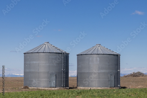 Two glavanized grain silos