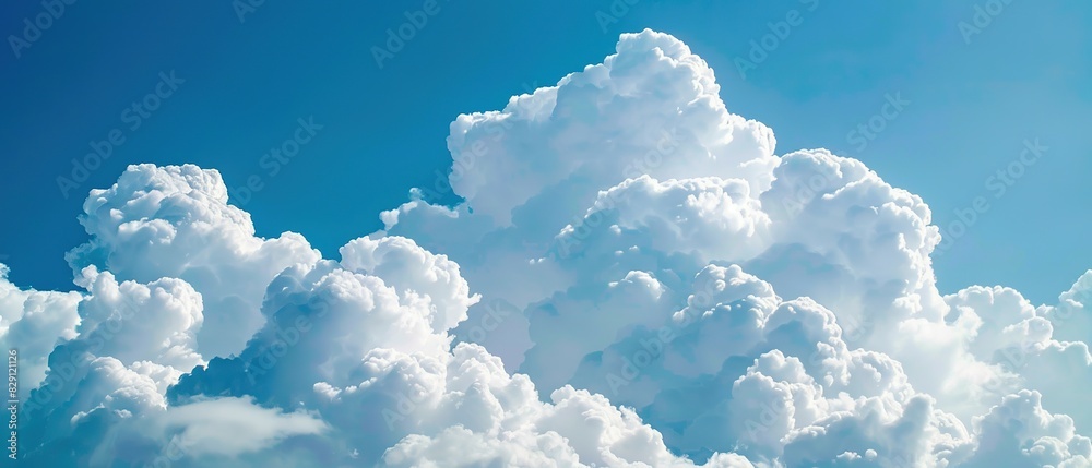 Large white clouds against a blue sky background. A Majestic Display of White Clouds