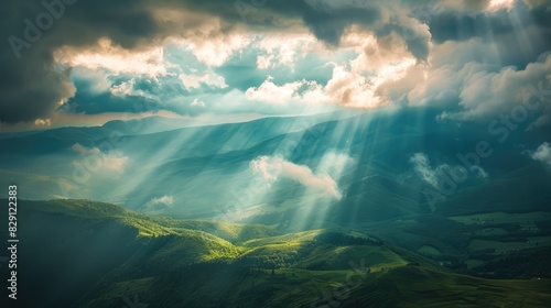 Sunlight shines through clouds over hilly valleys