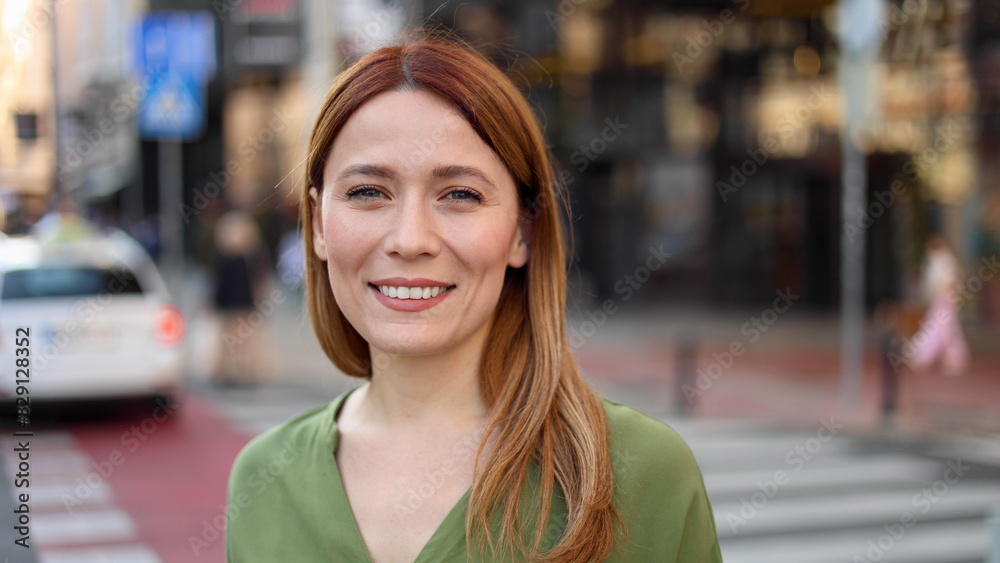 Portrait of a beautiful, redhead young woman
Portrait of a beautiful, redhead young woman