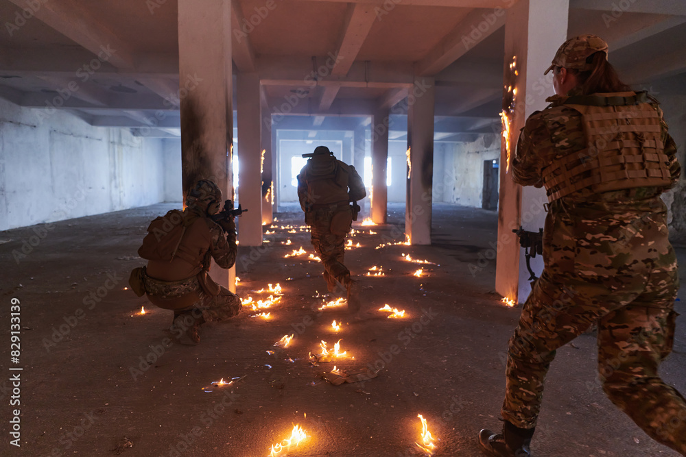  A group of professional soldiers bravely executes a dangerous rescue mission, surrounded by fire in a perilous building.