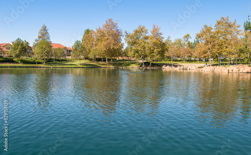City of Rancho Santa Margarita, Orange County USA, view of the lake and mountains near the trees 