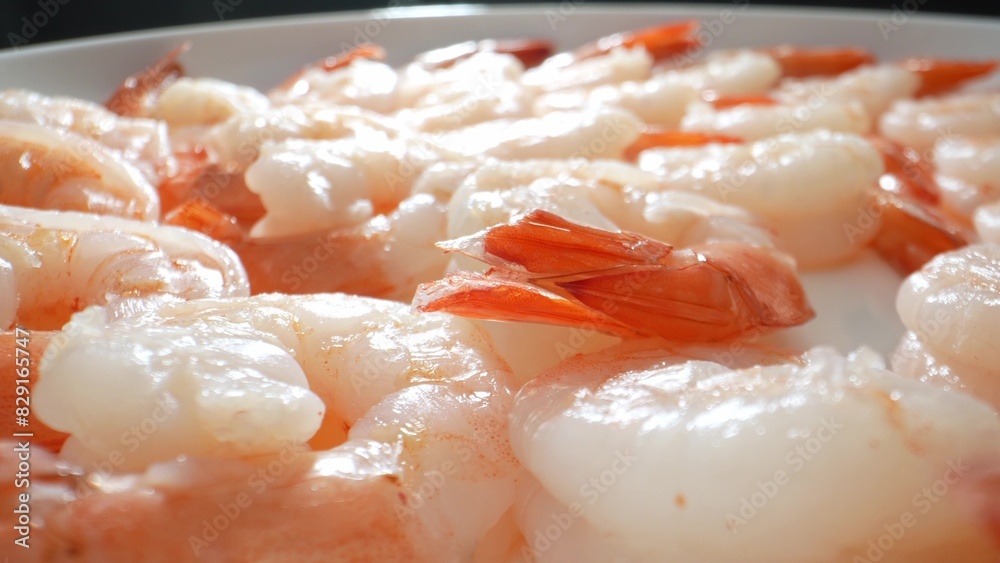 Frozen shrimp: ocean-harvested crustaceans, promptly processed, frozen for freshness, flavor preservation. Popular globally for mild taste, cooking versatility, quick preparation. Shrimp background.
Frozen shrimp: ocean-harvested crustaceans, promptly processed, frozen for freshness, flavor preservation. Popular globally for mild taste, cooking versatility, quick preparation. Shrimp background.