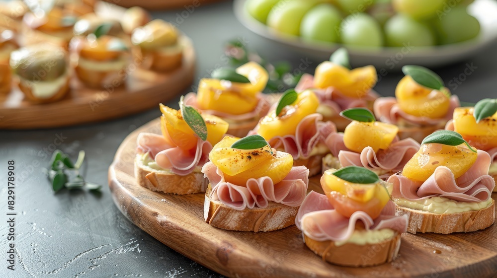 Tasty small snacks with ham cheese and fruit Tasty small snacks with ham cheese and fruit