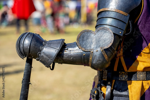 Photography Elements of medieval iron knight armor for battle, helmet, spaulders, pouldrons,