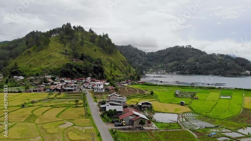 Aerial video view of a small hillside village on the edge of Takengon city, Aceh photo