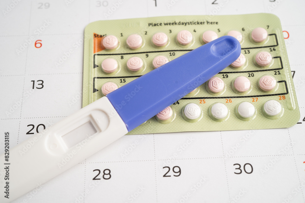Pregnancy test and birth control pills, contraception health and medicine. Pregnancy test and birth control pills, contraception health and medicine.
