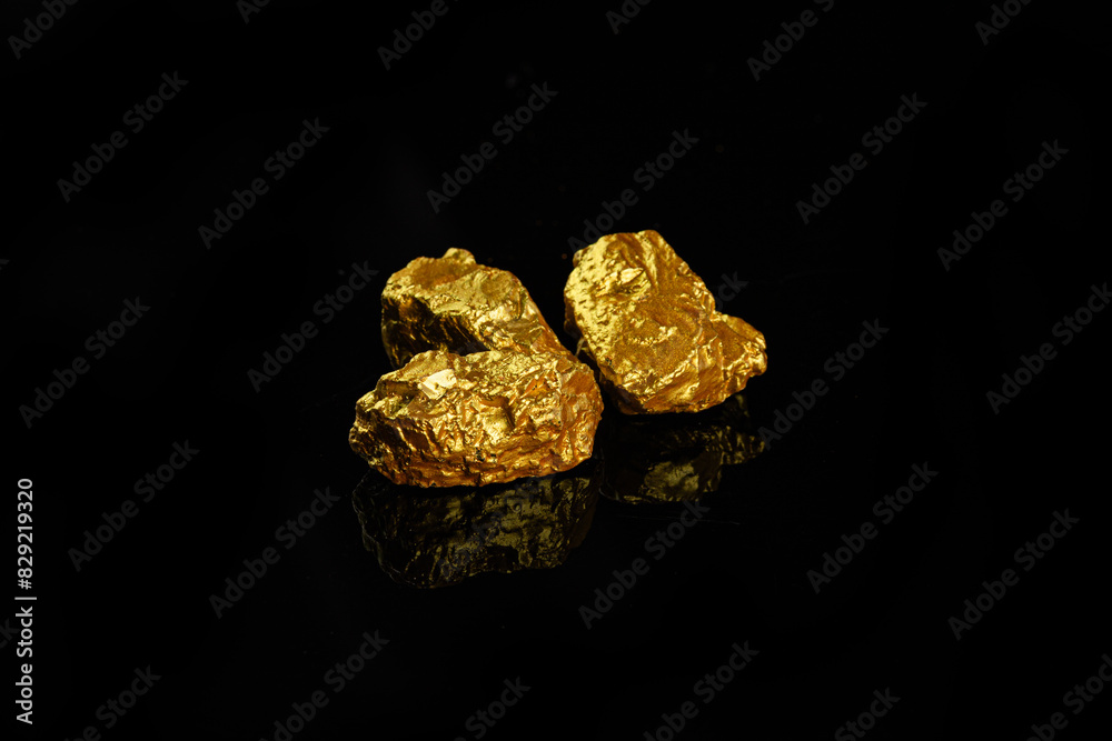 Closeup of big gold nugget finance concept Closeup of big gold nugget finance concept