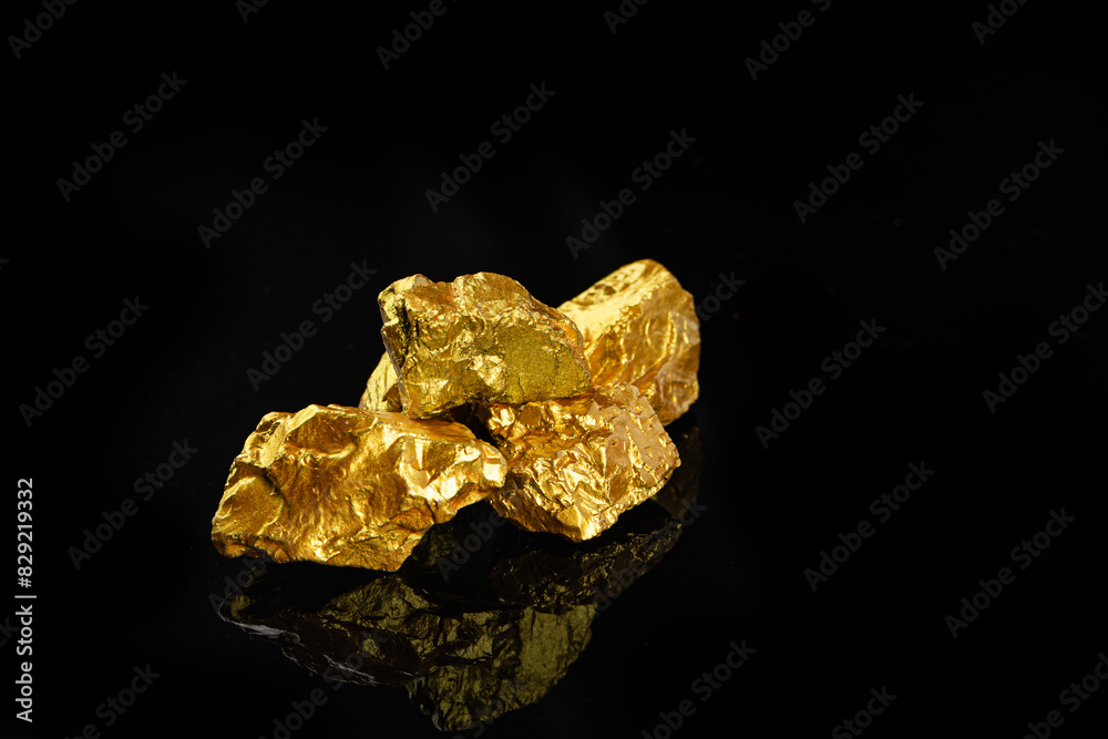 Closeup of big gold nugget finance concept Closeup of big gold nugget finance concept