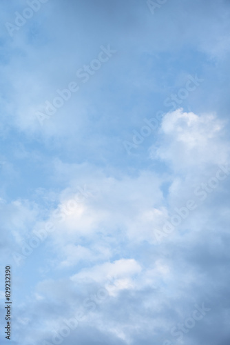 Fototapeta Naklejka Na Ścianę i Meble -  Clean blue and white sky nature background, medium blue sky with painterly white and blue clouds
