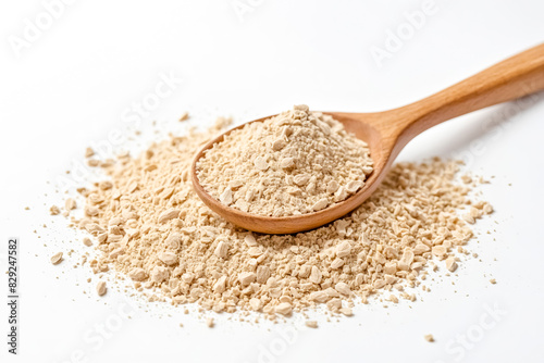 Dried Ginger Powder In Wooden Spoon