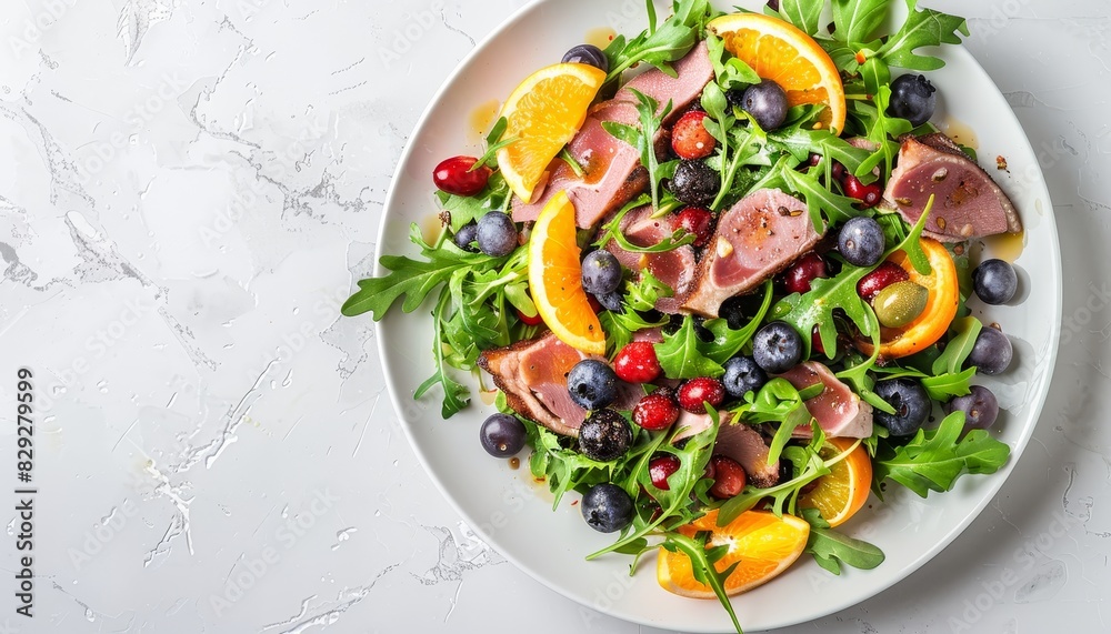 Smoked duck salad with fruits and greens white table background top view Bright sunlight and shadow pattern Smoked duck salad with fruits and greens white table background top view Bright sunlight and shadow pattern