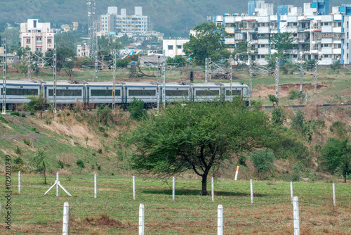 The Solapur Mumbai Vande Bharat Express Train heading towards Mumbai, near Pune India. photo