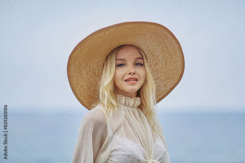 Blonde Woman in Elegant Beach Outfit Outdoors During Summer Vacations