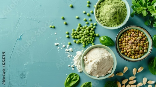 Plant based protein sources and pea protein powder on blue green backdrop fitness nutrition concept for vegans and vegetarians
