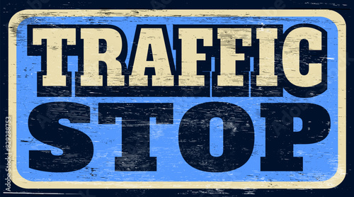 Aged and worn traffic stop sign on wood