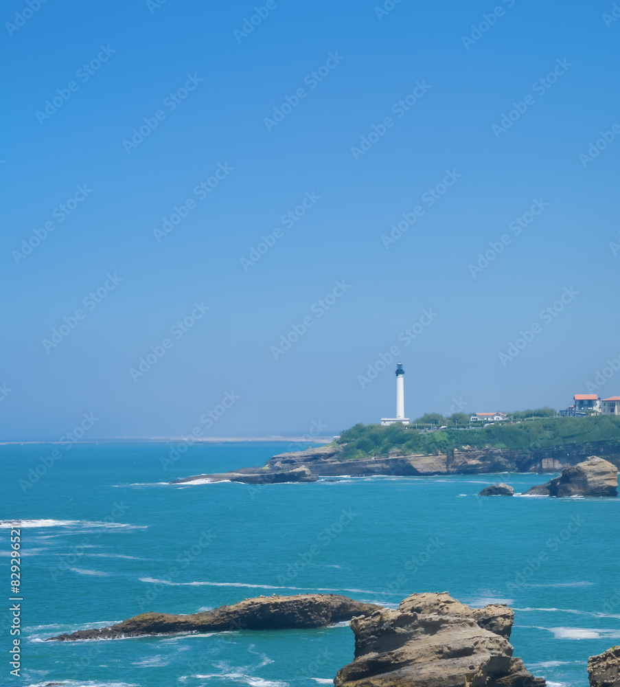 View with a lighthouse in the distance on the coast at Biarritz