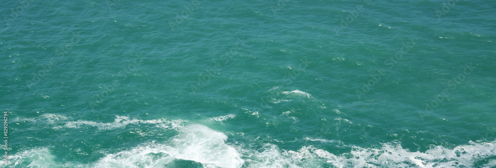View of a green sea surface with waves View of a green sea surface with waves