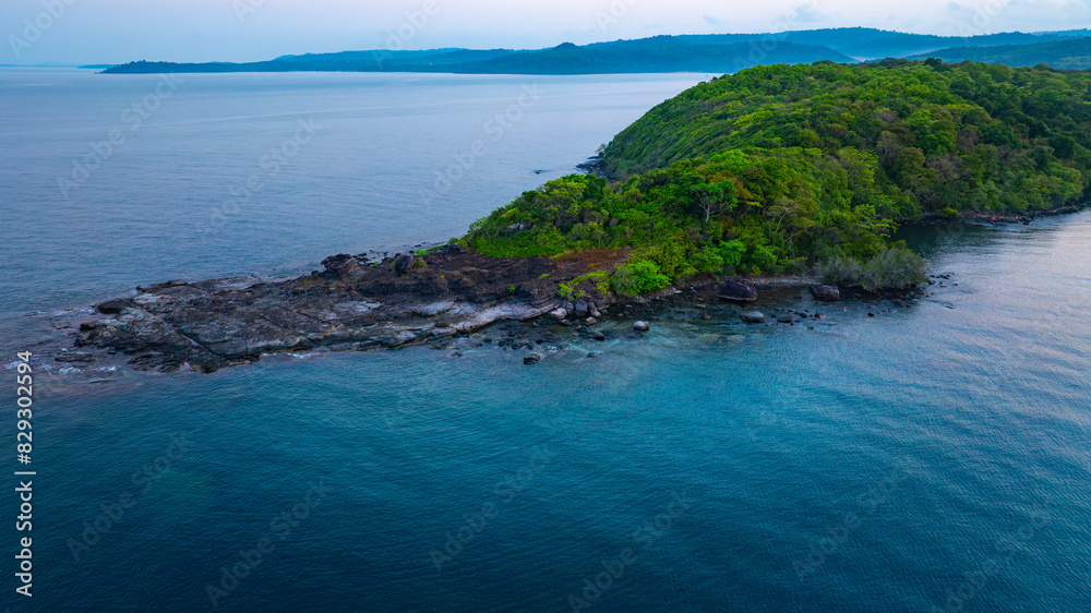 Fototapeta premium Aerial view of islands, Andaman Sea, natural blue waters and forests, tropical sea of Thailand. Beautiful scenery of the island with beautiful nature. 