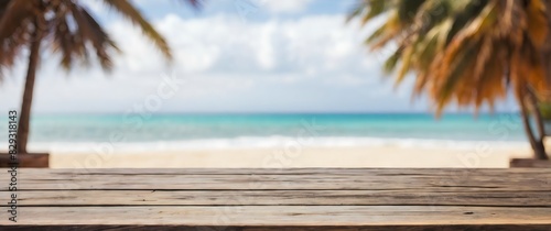 Wooden table with blurry beach summer background