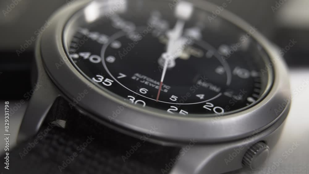 Macro close up of an accurate automatic mechanical watch with moving hands Macro close up of an accurate automatic mechanical watch with moving hands