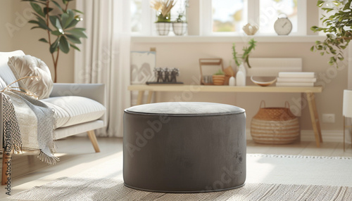 Elegant gray velvet ottoman in a minimalist living room with neutral tones and simple decor  providing a stylish and comfortable seating option