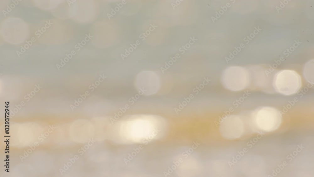 Blurred background golden glitter shiny sparkling banner. Glitter digital light blur bokeh glow soft backdrop effect. Gold bokeh template for digital presentation slideshow background desgn element