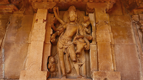 Carved Idol of Lord Shiva with Nandi on Shri Durga Temple, Aihole, Bagalkot, Karnataka, India. photo