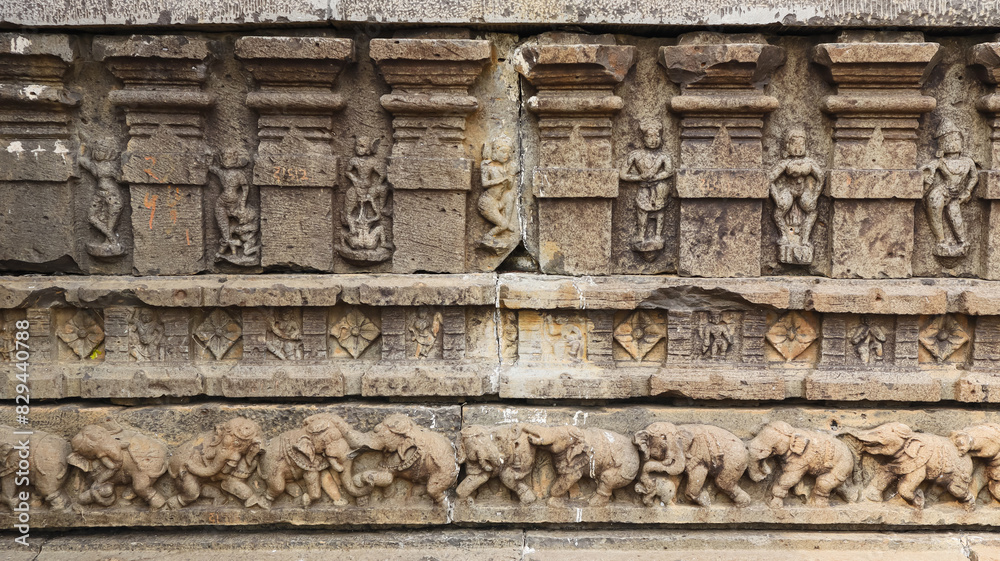 Carving of Some Erotic Sculptures and Elephants in Lower Case, Kedareshwara Temple, Dharmapuri, Beed Maharashtra India. Carving of Some Erotic Sculptures and Elephants in Lower Case, Kedareshwara Temple, Dharmapuri, Beed Maharashtra India.