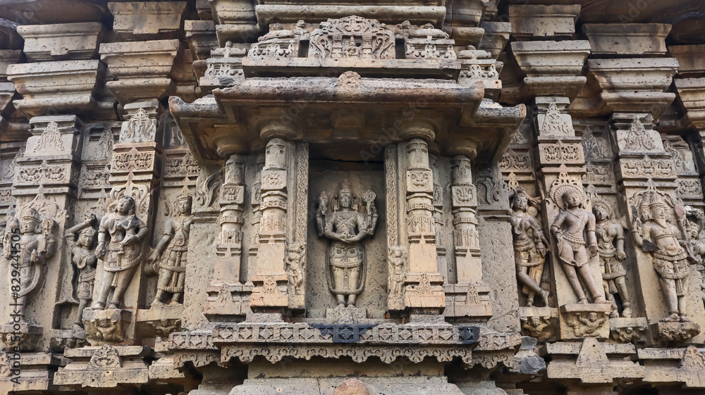 Carvings of Hindu Deities and Lord Vishnu in the Centre on the Kedareshwara Temple, Dharmapuri, Beed Maharashtra India. Carvings of Hindu Deities and Lord Vishnu in the Centre on the Kedareshwara Temple, Dharmapuri, Beed Maharashtra India.