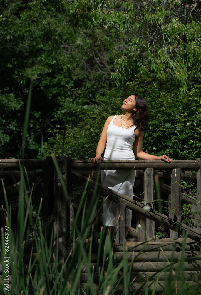 Latin woman doing a bath in the forest. Healthy life style Latin woman doing a bath in the forest. Healthy life style