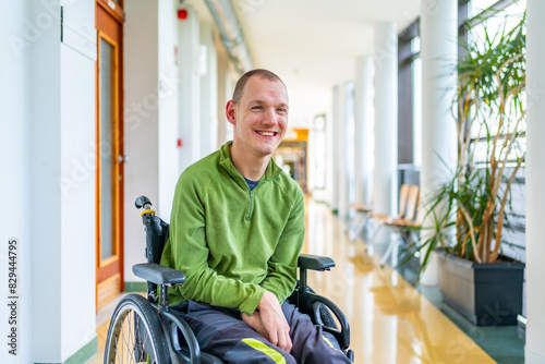 Disabled man in wheelchair in the university photo