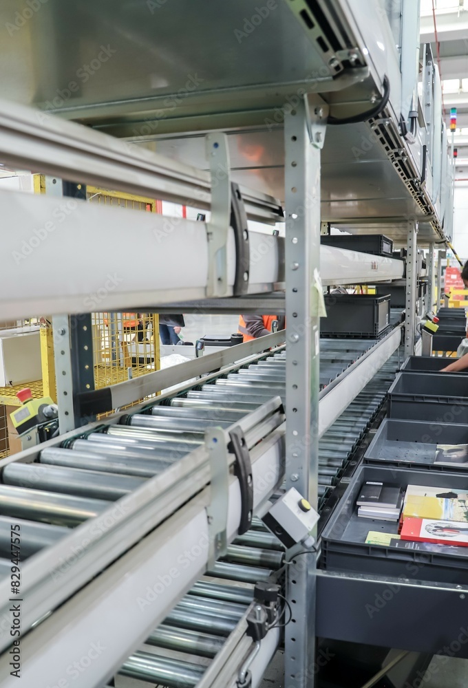 conveyor belts inside a logistics warehouse conveyor belts inside a logistics warehouse
