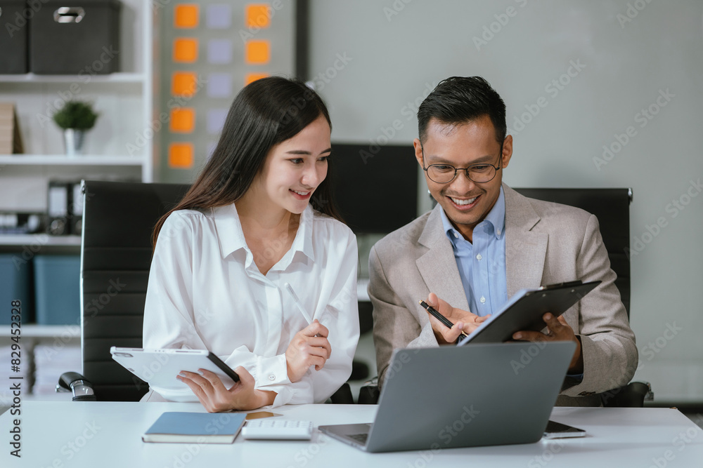 Obraz premium Project manager working and update tasks with milestones progress planning and professional investor working new start up project in the office..
