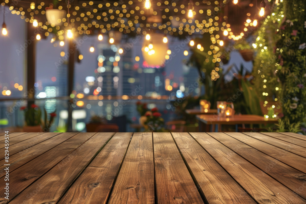 A wooden bar top in the foreground with a blurred background of an urban rooftop bar. The background includes stylish seating, plants, string lights, a panoramic city view. A wooden bar top in the foreground with a blurred background of an urban rooftop bar. The background includes stylish seating, plants, string lights, a panoramic city view.