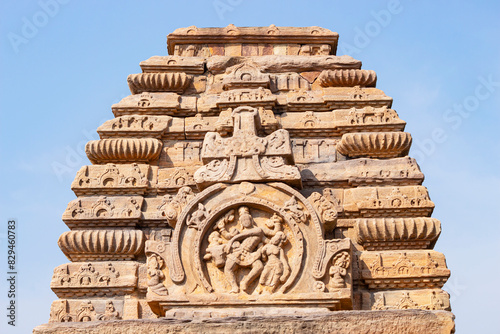 Carving of Dancing Shiva on the Shikhara of Sri Galaganaatha Temple, 8th Century Shiva Temple, Pattadakal, Karnataka, India. photo