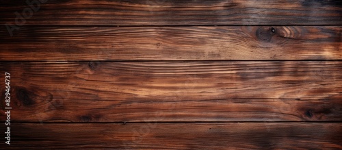 Top view of a vintage teak wooden texture background with a dark and aged appearance perfect for copy space image