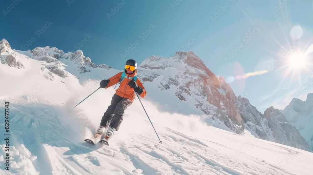 Man freeride skier running downhill on sunny Alps slope