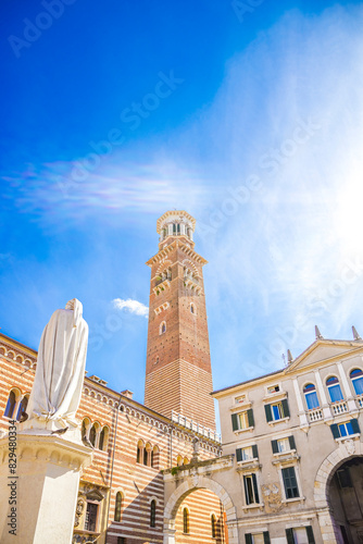 Torre dei Lamberti with Dante Alighieri monument on Piazza dei Signori, Veneto, Verona, Italy photo