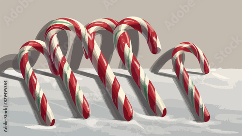 Candy canes on grey table. Traditional Christmas trea photo