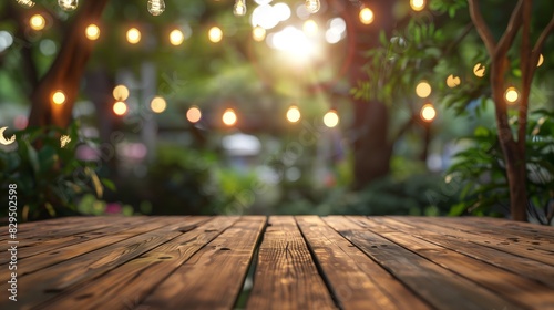 Empty wooden tabletop set in a lush home backyard garden, perfect for outdoor parties. The scene is inviting with greenery and festive elements, offering space for your text or product display photo