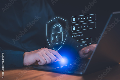 Cyber ​​security and digital data protection technology concept. Man use a laptop computer type the username and password. User privacy security and protect personal data internet network.
