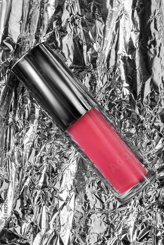 Lipstick on foil background