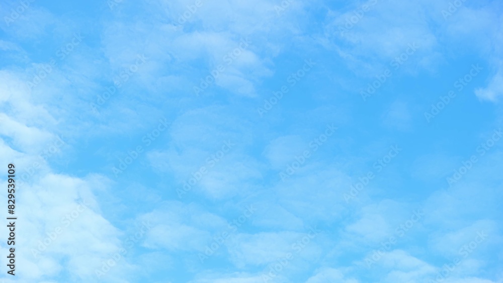 A bright blue sky filled with soft, puffy clouds that appear to be scattered evenly across the expanse. The clouds have a gentle, cotton-like texture, contributing to a peaceful and airy atmosphere.
A bright blue sky filled with soft, puffy clouds that appear to be scattered evenly across the expanse. The clouds have a gentle, cotton-like texture, contributing to a peaceful and airy atmosphere.