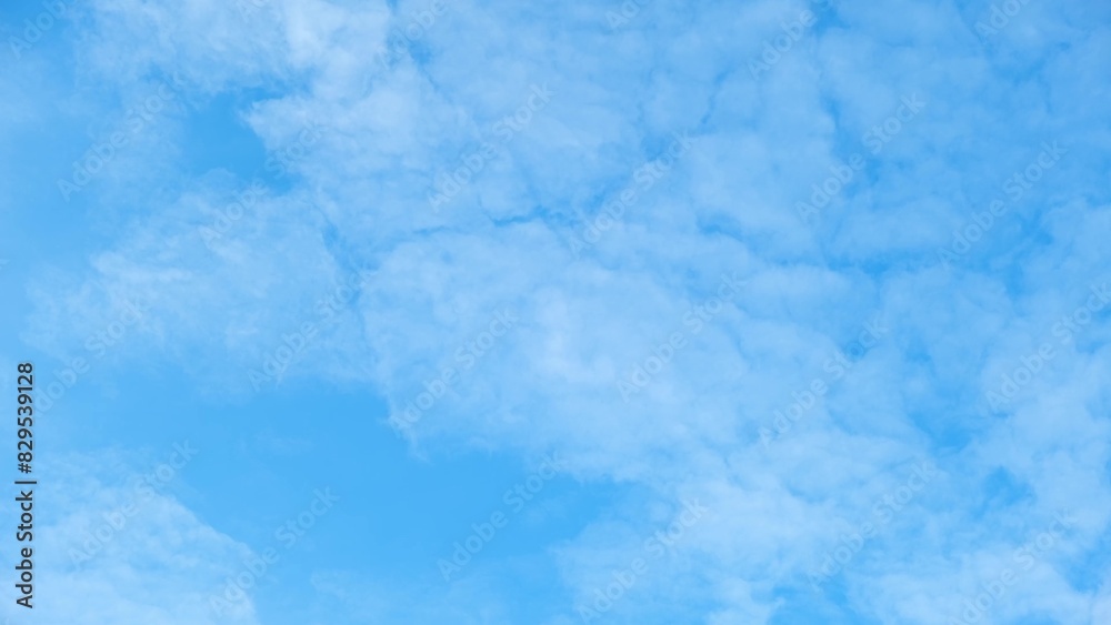 A clear blue sky with a pattern of fluffy, white clouds. The clouds are densely packed, creating a textured, almost quilt-like appearance against the vibrant blue backdrop. Cloud background.
A clear blue sky with a pattern of fluffy, white clouds. The clouds are densely packed, creating a textured, almost quilt-like appearance against the vibrant blue backdrop. Cloud background.