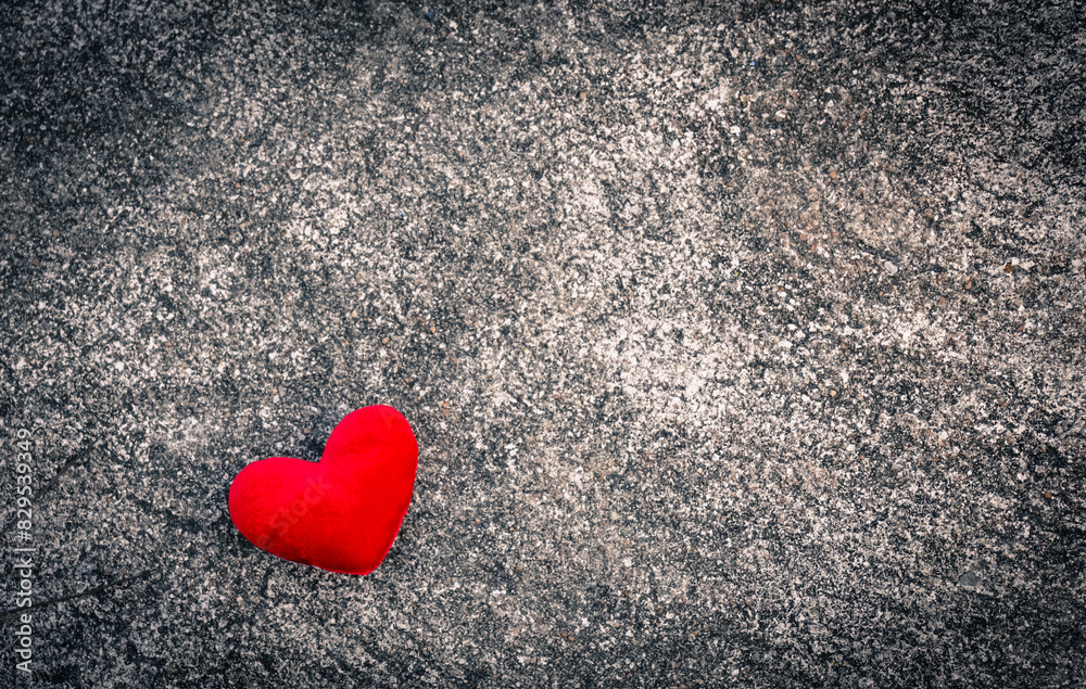 the red heart on the dark background with dramatic tone the red heart on the dark background with dramatic tone